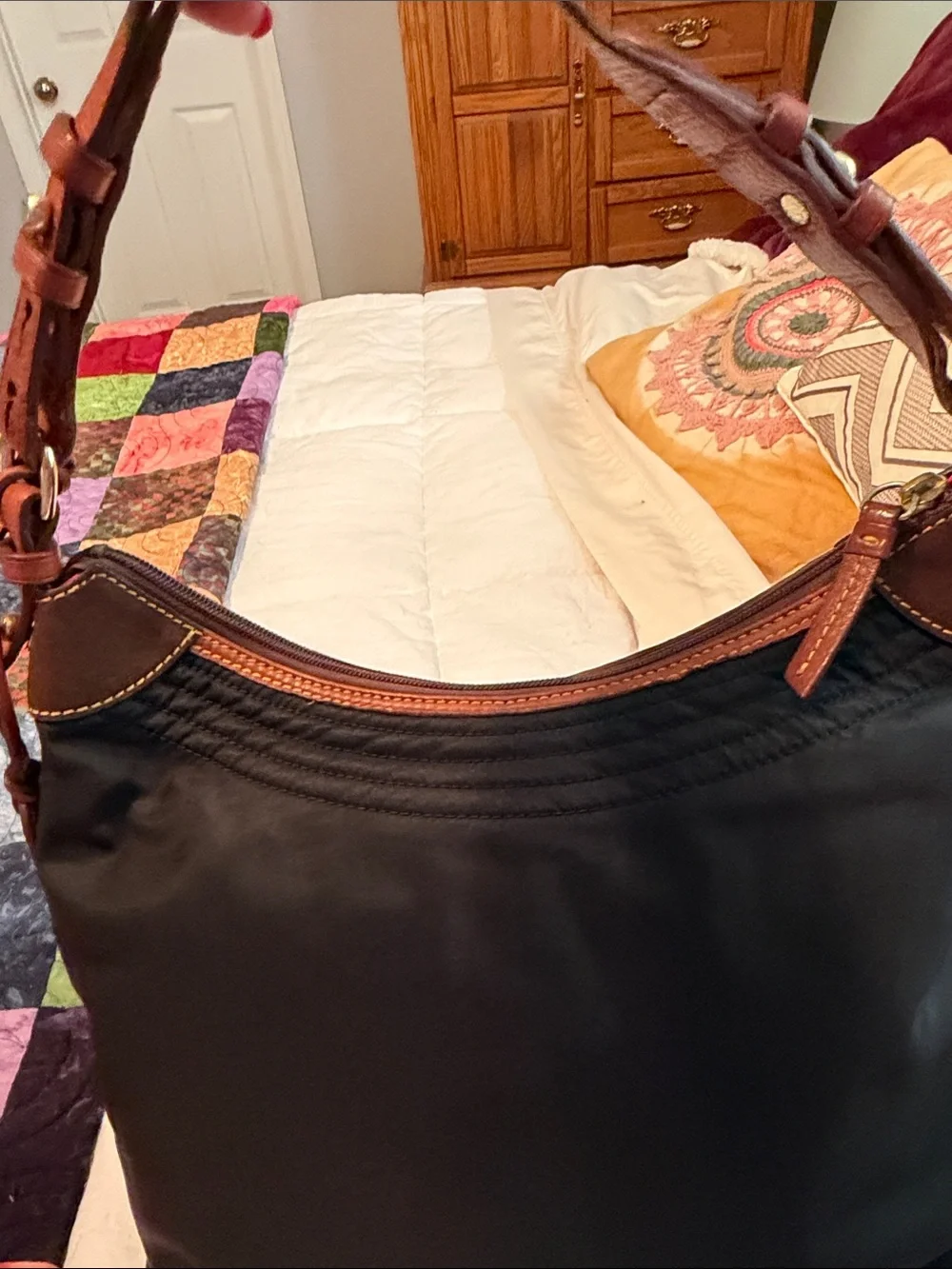 Dooney & Bourke large Erika black nylon quilted shoulder bag with tan leather
